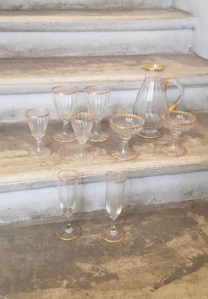 null Part of a gold combed glass set including: 11 water glasses, 12 wine glasses,...