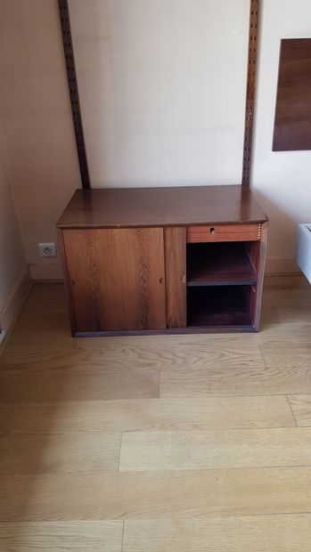 null Pair of bedside cabinets opening with two sliding panels, a drawer and a shelf

Two...