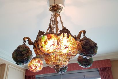 null A six-light gilt bronze basket chandelier made of coloured glass petals 

Height...