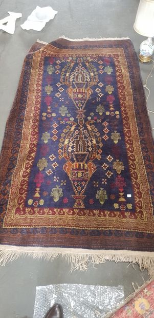 null A Berber carpet with vases decoration

Lot presented by SCP Studer-Fromentin...