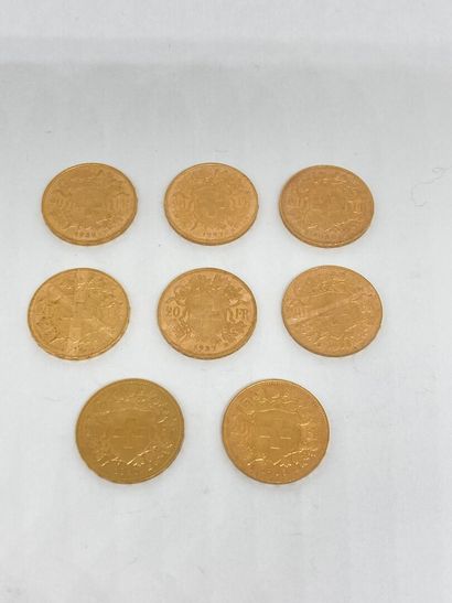 null 
8 pièces de 20 frs Or Suisse (1 de 1914 B; 2 de 1927 B; 2 de 1930 B; 3 de 1935...