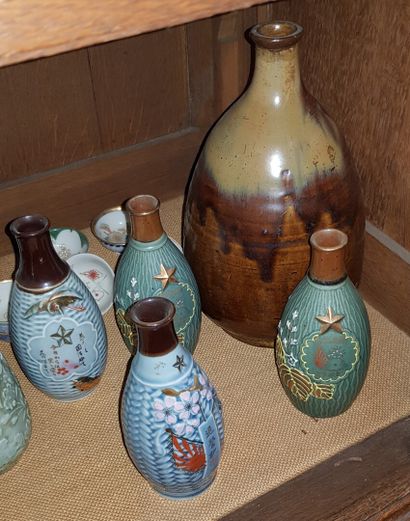 null A lot of sake bottles and glasses, in porcelain or stoneware.



We join there:

A...