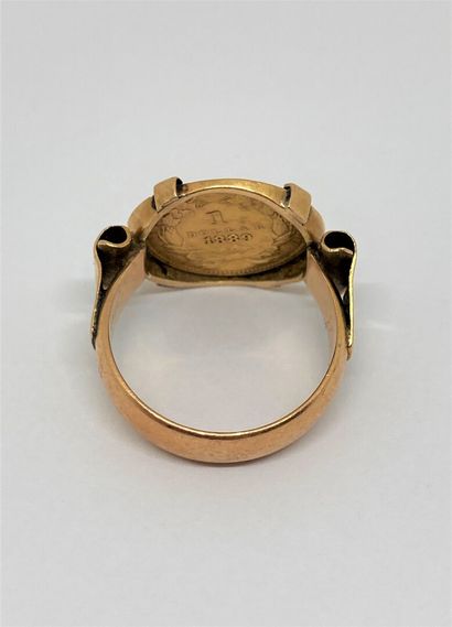 null A 1 Dollar gold coin mounted in a ring
