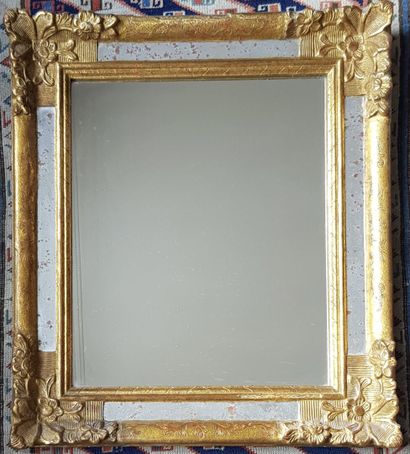 null Miroir à parecloses en bois doré de style Régence

Haut. 63 - Larg. 55 cm