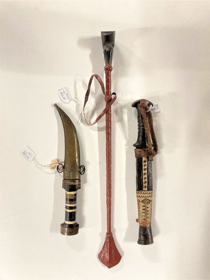 null Two daggers of black Africa:

- one entirely covered with leather and skin....