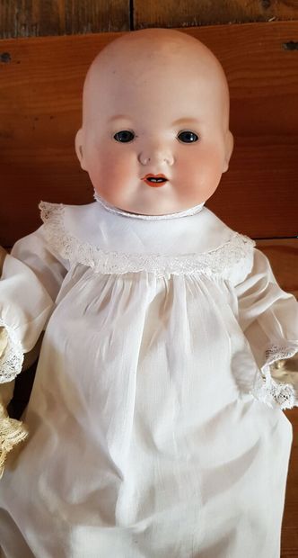null Lot including
Two dolls in christening dress 
two dolls 
two hats