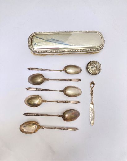 null Lot of 925°°¨% silver including:
A small Art Nouveau powder case, and a small...