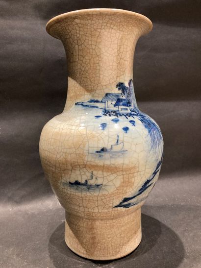 null CHINA
Baluster vase in cracked ceramic decorated in blue with lake landscap...