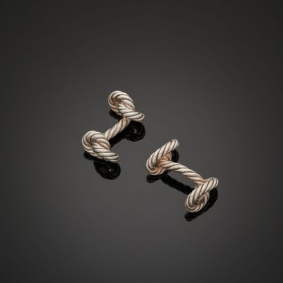  GEORGES LENFANT
Pair of cufflinks in 1er titre 950‰ silver, with knotted rope motifs.
French... Gazette Drouot