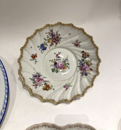 null Two white German porcelain dishes decorated with flowers, blue camaïeu dish...