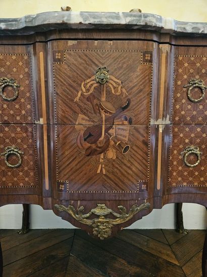 null Louis XVI style chest of drawers opening with two drawers. Marquetry decorated...