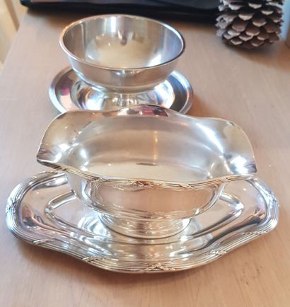 null Sauceboat and its tray highlighted by a ribboned rush and bowl on silver-plated...