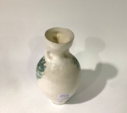 null ROULOT (1917-2007)
Vase en céramique peint sous engobe orné d'une figure féminine,...