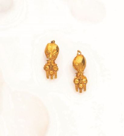 null Paire de pendants d’oreille anthropomorphes en or jaune (750 °/00) figurant...