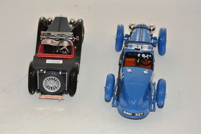 null (2) voitures de sport 1/18 :

- MG TC , noire, made Road China, (E)

- Aston...