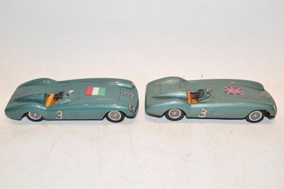 null BANDAI (2) Ferrari cars, friction, in green water sheet, one with English flag...