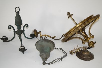 null Set of three brass and gilt bronze light fixtures. A wall light is attached....