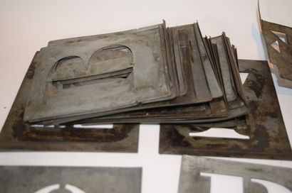 Important batch of 69 metal stencils of letters,...
