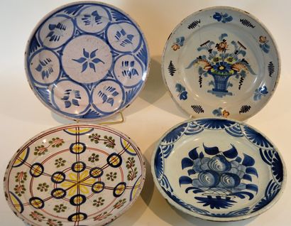 null BRUGGES XVIIIth (4) plates in stanniferous earthenware with stylized floral...