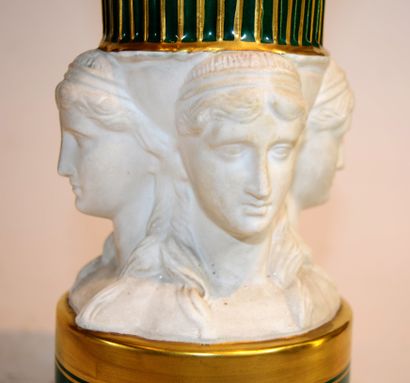 null PARIS: porcelain vase resting on four caryatid heads, green and gold, porcelain...