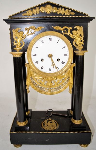 null Black marble portico clock, four columns, enamelled dial with Roman and Arabic...