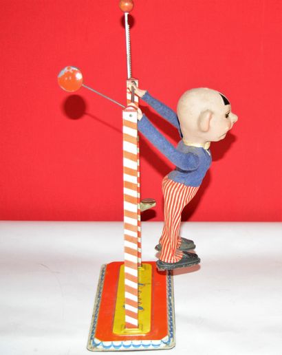 null Arnold: West Germany, acrobat Jimmy: hand toy featuring an acrobatic clown with...