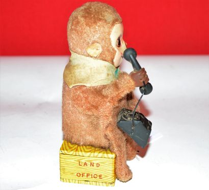 null Japan: Telephone monkey land office. Mechanical monkey making a phone call....