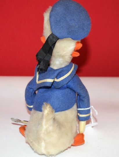 null Donald Duck mechanical, Walt Disney production. Height: 21cm. plush to clean,...