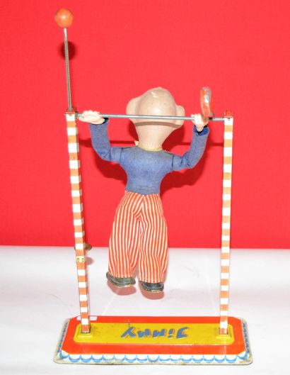 null Arnold: West Germany, acrobat Jimmy: hand toy featuring an acrobatic clown with...
