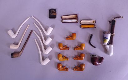null Collection:( 19): 14 clay pipes, pyrogen matchbox, 2 German pipes, mother of...