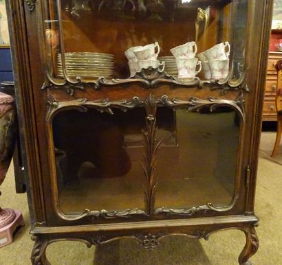 null Piece of furniture: 19th century Regency window in carved oak with glass doors...