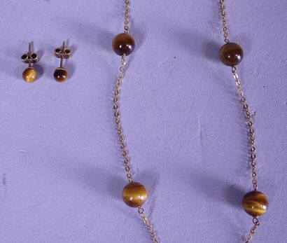 null Jewel: Necklace and pair of earrings in 18K yellow gold and tiger eye pearls...