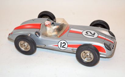 null JOUSTRA: Racing car N°12, with friction in sheet metal. L: 28 cm. Traces of...