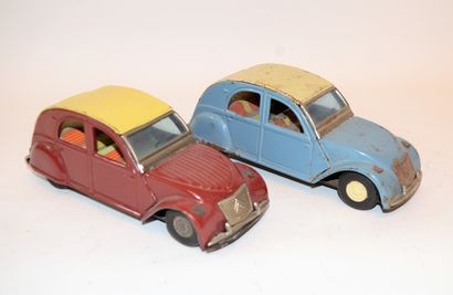 null DAIYA, Japan: (2) 2 Cv Citroen friction in sheet metal, one red and one blue....