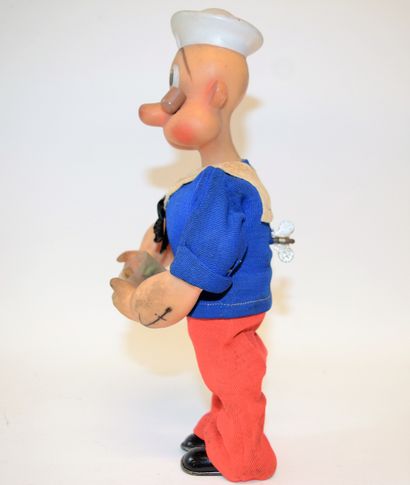 null KARL Germany: Popeye mechanical toy. Plastic, fabric, metal. Height: 27 cm....