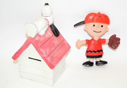 null SNOOPY and Charlie Brown:

-Ceramic money box with Snoopy lying on the floor...