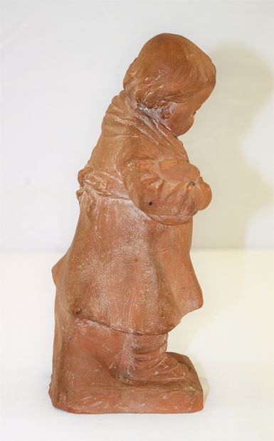 null Statuette of a child in terracotta bearing the initials J.W. Height: 22.5 c...