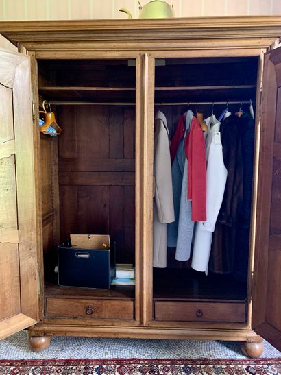 null French Regency period wardrobe, with two doors, in waxed and molded light oak,...