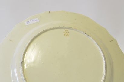 TOURNAI TOURNAI plate (beginning of the second period around 1865) of festooned form,...