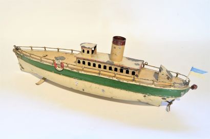 UBERLACKER UBERLACKER river boat painted cream and green, one chimney, lg. 35cm,...