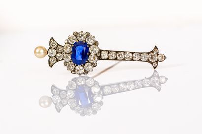 null 
FRENCH WORK




A two-tone gold transformation brooch set with a cushion sapphire...