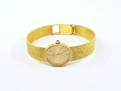 null BAUME ET MERCIER 
Montre bracelet de dame en or jaune 750°, boîtier ovale, cadran...