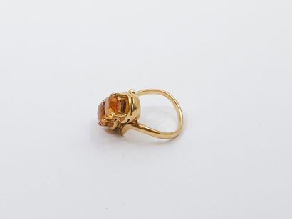 null Yellow gold ring 750° decorated with two orange stones
Gross weight : 6,57 g...