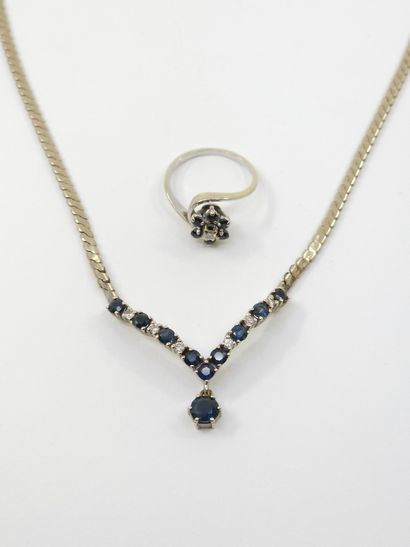 null Half set in white gold 750° decorated with sapphire 
Necklace and ring
Gross...