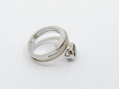 null RING in white gold 750° set with a smoky quartz in closed setting of about 1.12...
