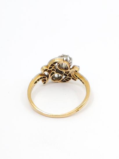 null RING you and me in two-tone 750° gold set with old-cut diamonds of about 0.20...