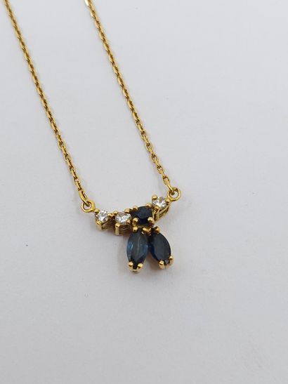 null NECKLACE in yellow gold 750° decorated with diamonds and sapphires 
Gross weight...