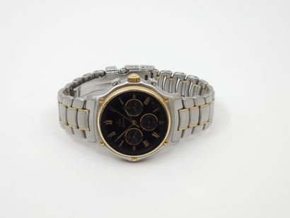 null EBEL Automatic
Steel and yellow gold 750° wristwatch, chronograph
Round case...