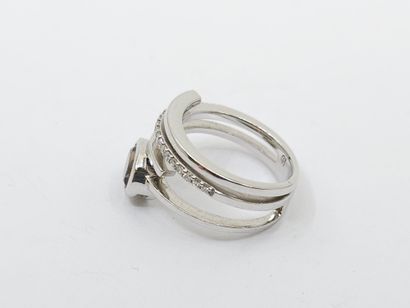 null RING in white gold 750° set with a smoky quartz in closed setting of about 1.12...