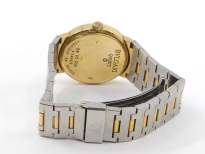 null BULGARI
Montre bracelet en or et acier, cadran noir, date à trois heures, mouvement...